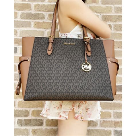 michael kors pochette jet set travel|Michael Kors large travel tote.